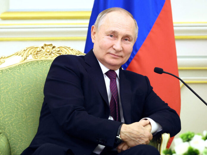 FILE PHOTO: Russian President Vladimir Putin attends a meeting with Saudi Crown Prince Mohammed bin Salman in Riyadh